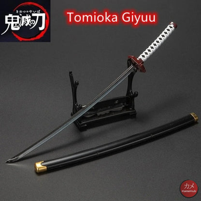 Demon Slayer / Kimetsu No Yaiba - Katana 25Cm In Metallo Ornamentale Giyu Tomioka Katane & Spade