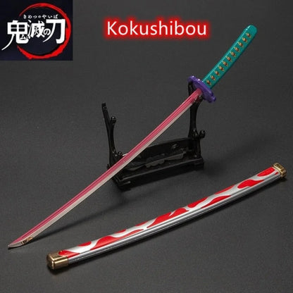 Demon Slayer / Kimetsu No Yaiba - Katana 25Cm In Metallo Ornamentale Katane & Spade