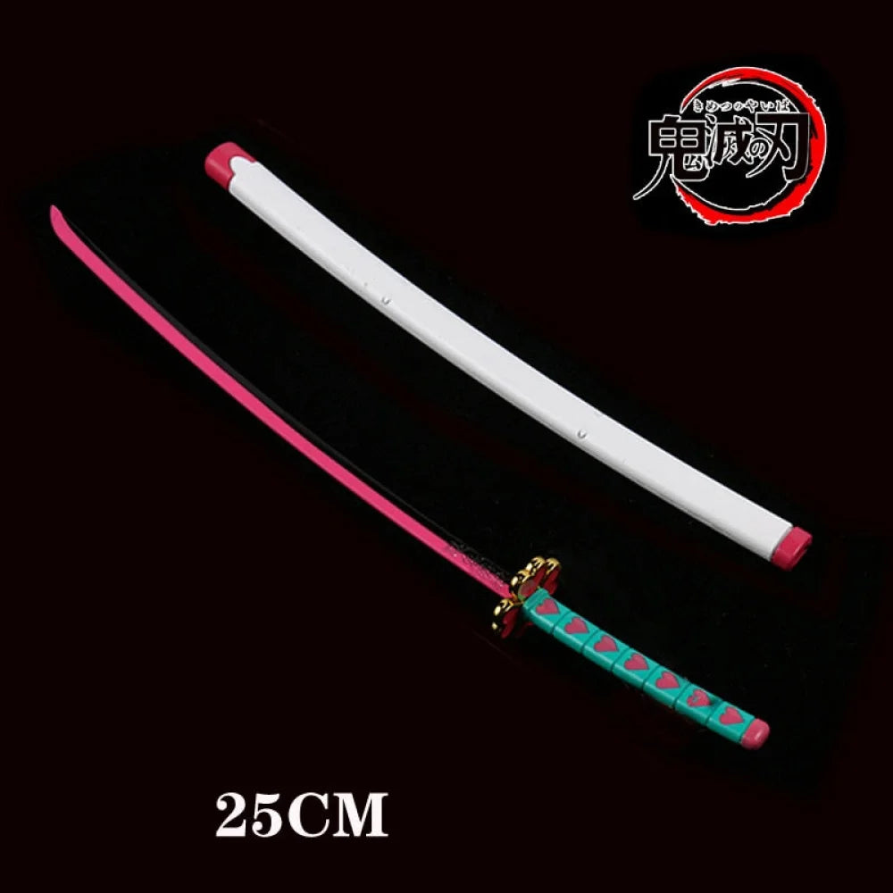 Demon Slayer / Kimetsu No Yaiba - Katana 25Cm In Metallo Ornamentale Katane & Spade