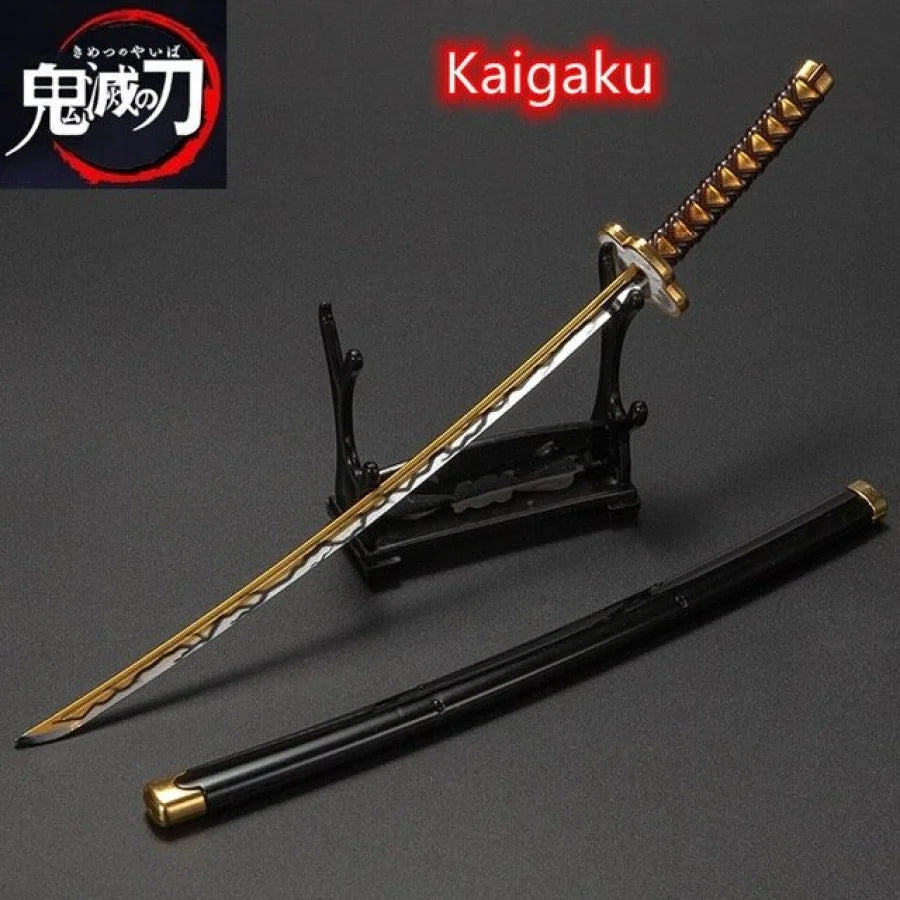 Demon Slayer / Kimetsu No Yaiba - Katana 25Cm In Metallo Ornamentale Katane & Spade