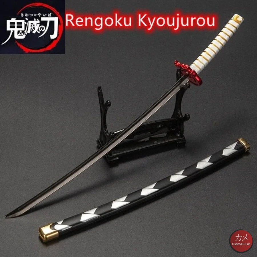 Demon Slayer / Kimetsu No Yaiba - Katana 25Cm In Metallo Ornamentale Rengoku Kyojurou Katane & Spade