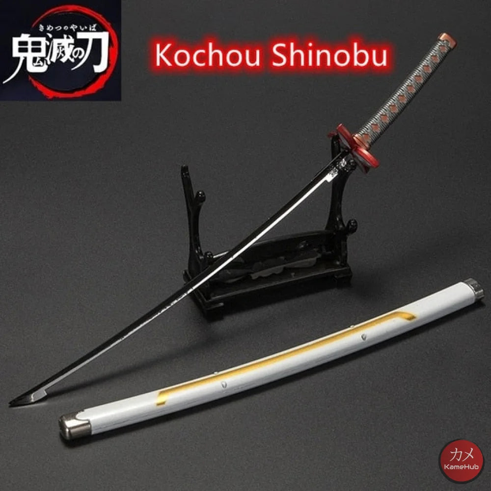 Demon Slayer / Kimetsu No Yaiba - Katana 25Cm In Metallo Ornamentale Shinobu Kochou Katane & Spade